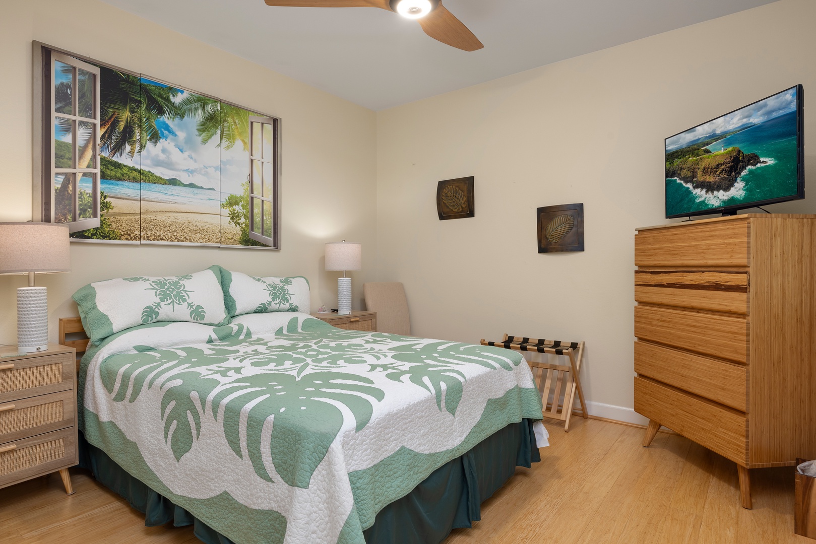 Drift into tropical dreams with this cozy bedroom's beach vibes and comfy bedding.