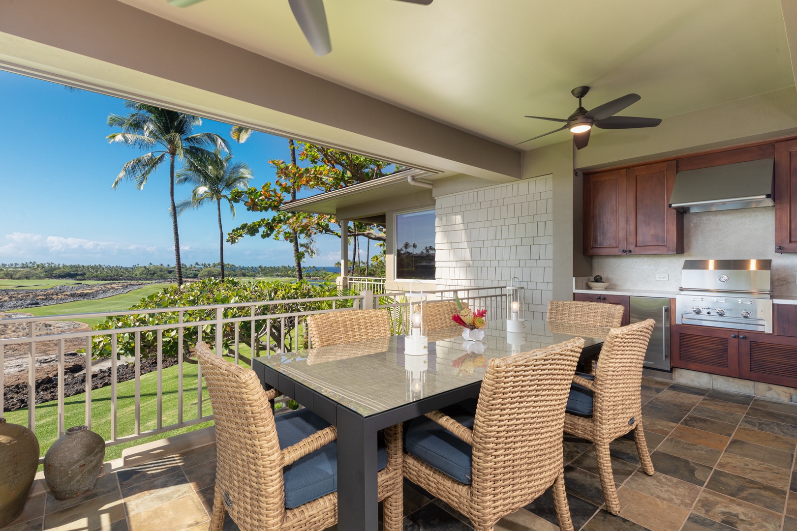 Kailua Kona Vacation Rentals, 3BD Waiulu Villa (111D) at Hualalai Resort - Your covered lanai offers breezy outdoor dining with stunning golf course views, perfect for morning coffee or evening meals.