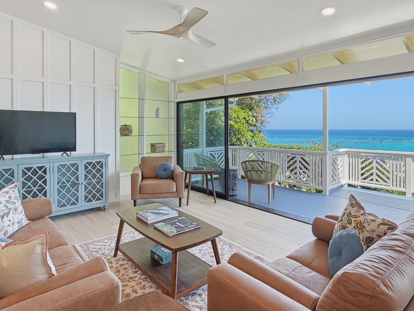 Kailua Vacation Rentals, Kai Nalu - Your calm oceanfront retreat with panoramic sea views through floor-to-ceiling windows. Relax on plush seating while ocean breezes flow through.