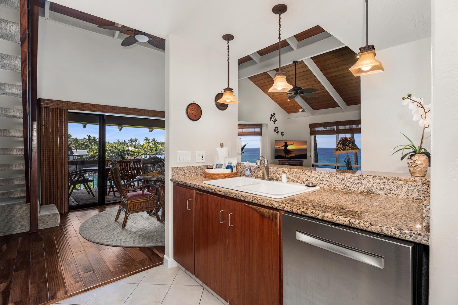 Kailua Kona Vacation Rentals, Kanaloa at Kona 3304 - Open kitchen design connects seamlessly to indoor and outdoor dining areas.