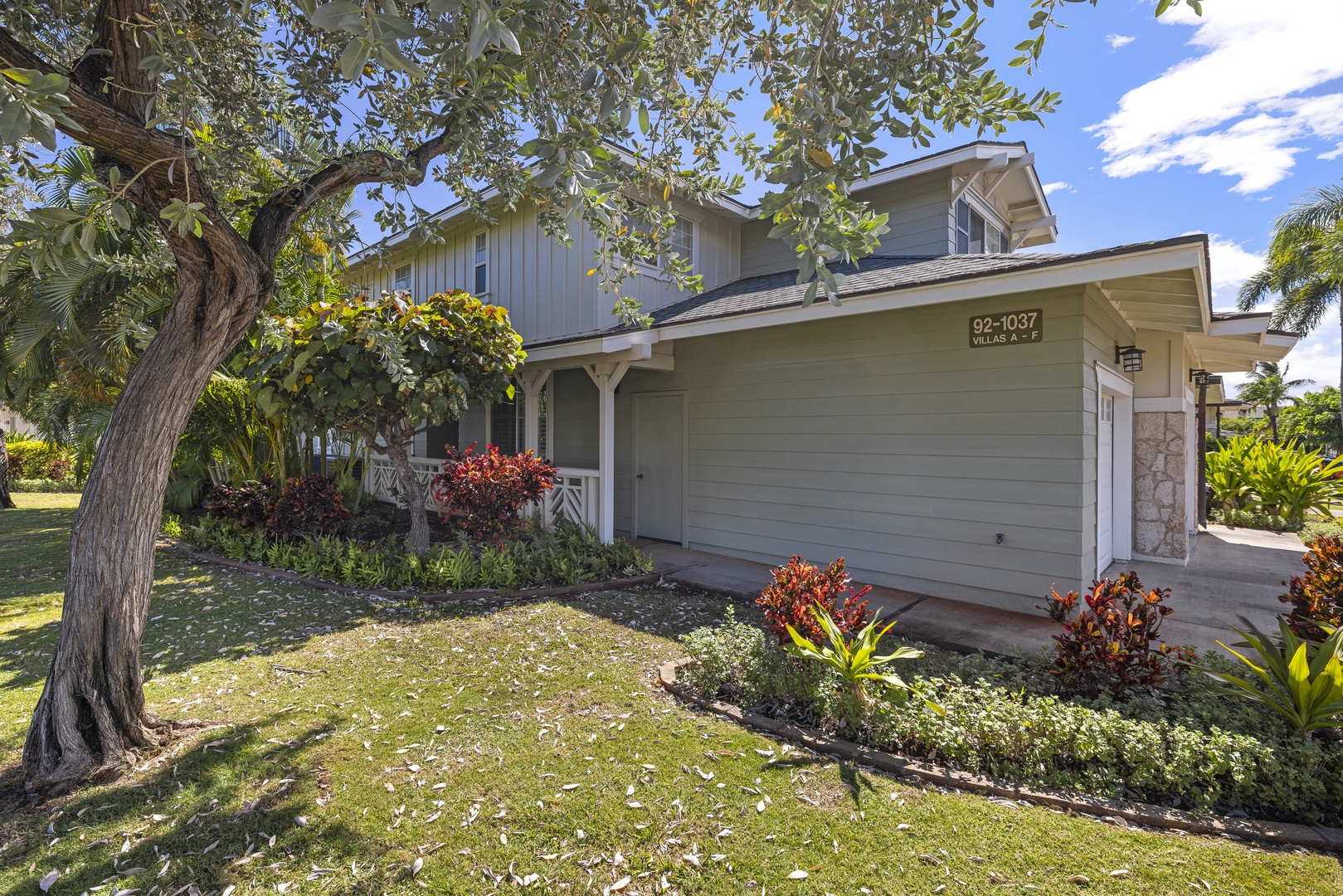 Nestled within the gated Ko Olina Kai community, this well-maintained residence offers a peaceful setting surrounded by lush tropical landscaping.