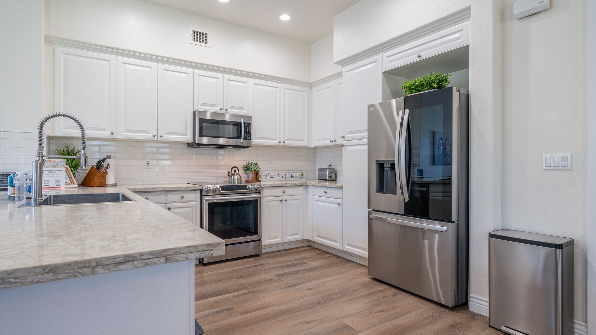 Kapolei Vacation Rentals, Coconut Plantation 1078-1 - The kitchen is equipped with stainless steel appliances for your culinary adventures.