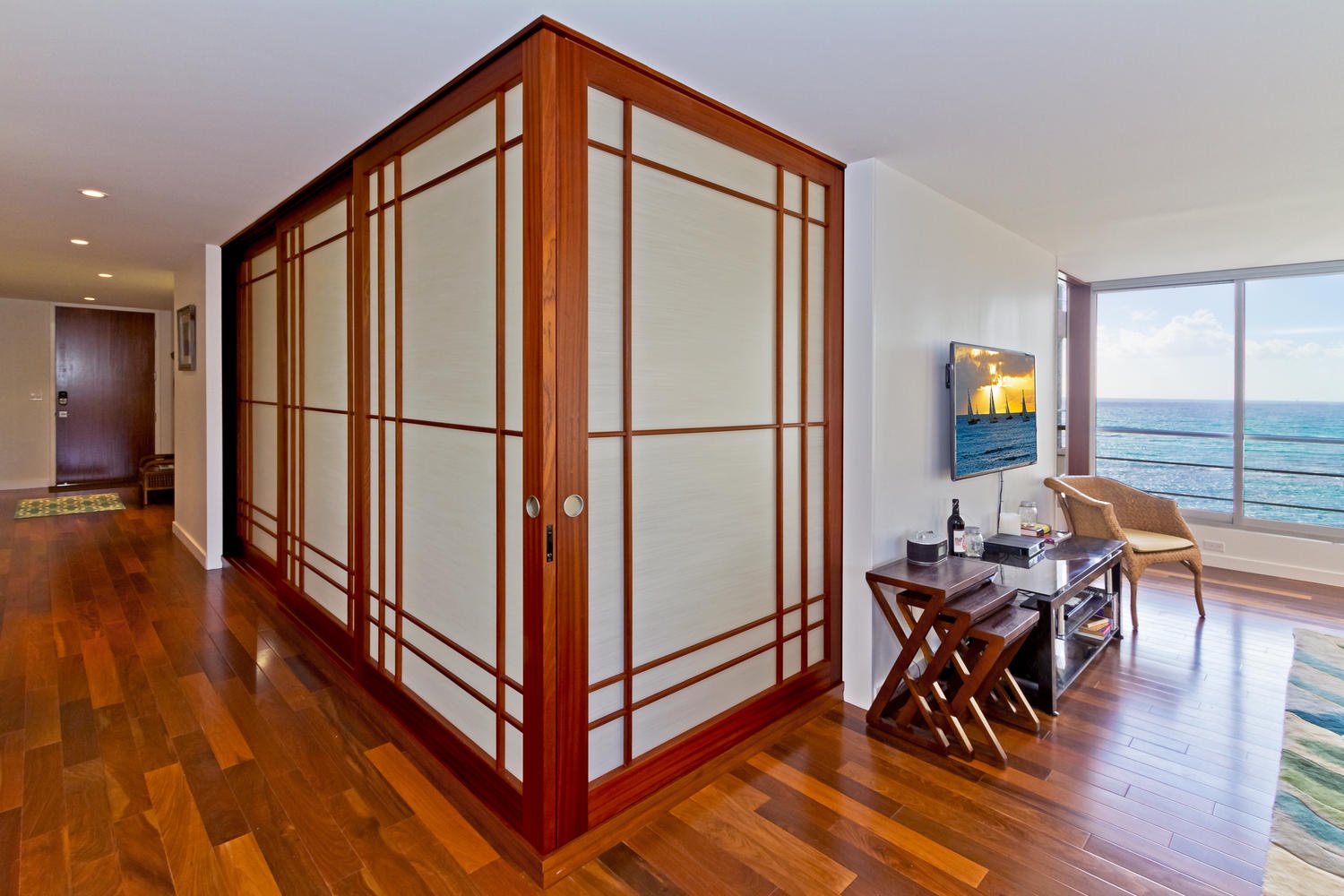 Honolulu Vacation Rentals, Executive Gold Coast Oceanfront Suite - View from dining area of living room and guest bedroom.