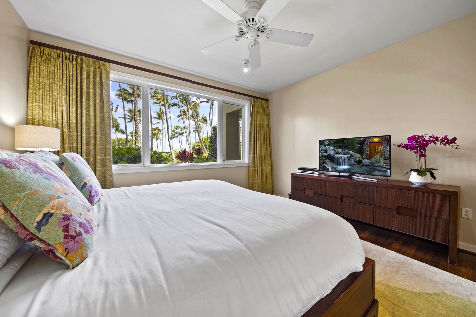Kahuku Vacation Rentals, Turtle Bay Villas 112 - Main bedroom with a view of the garden