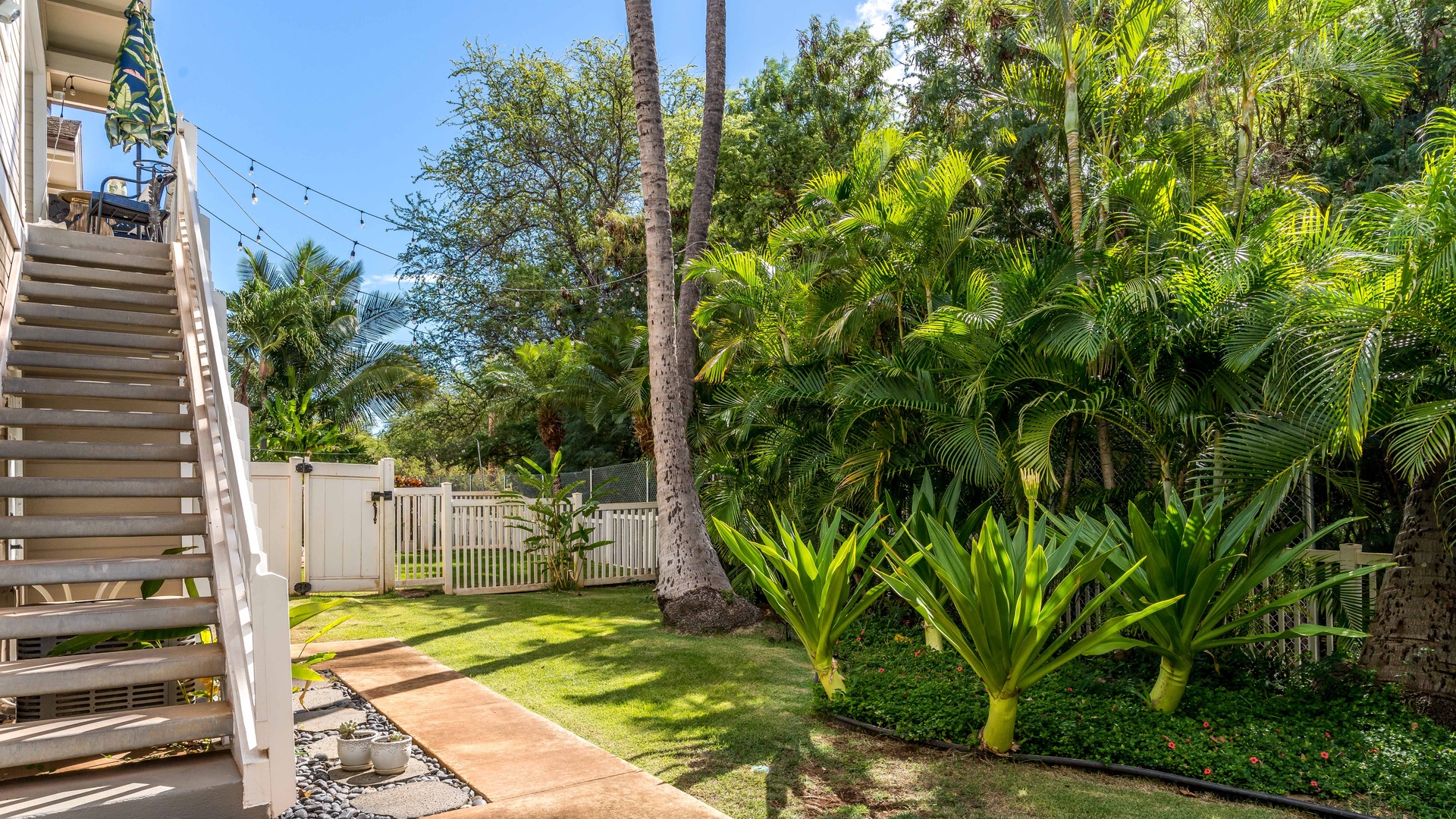 Kapolei Vacation Rentals, Fairways at Ko Olina 4A - Sun dappled palms.