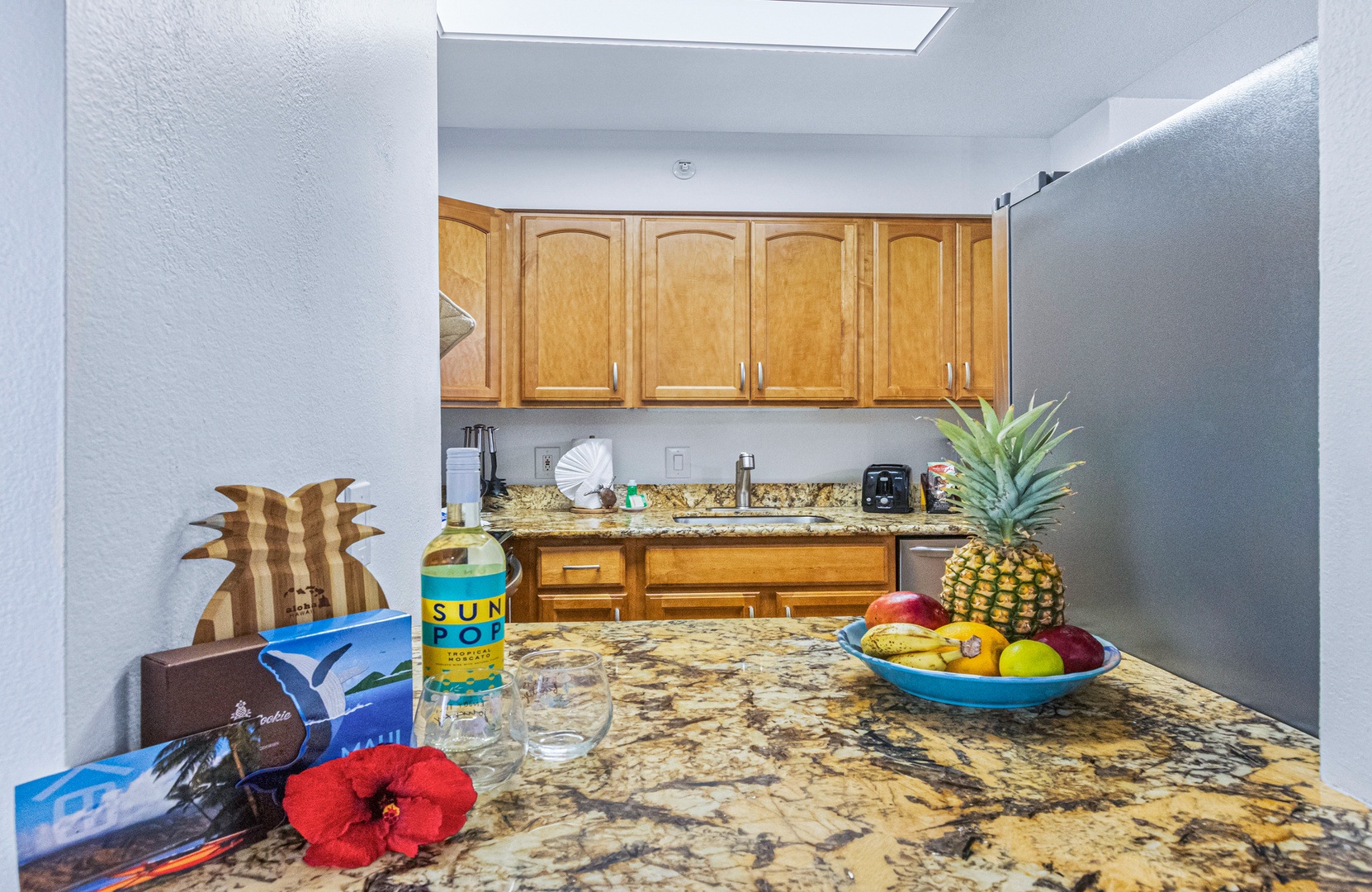 Lahaina Vacation Rentals, Royal Kahana 213 - Granite countertops provide plenty of space for meal preparation, with a welcoming touch of island-inspired décor to enhance your stay.