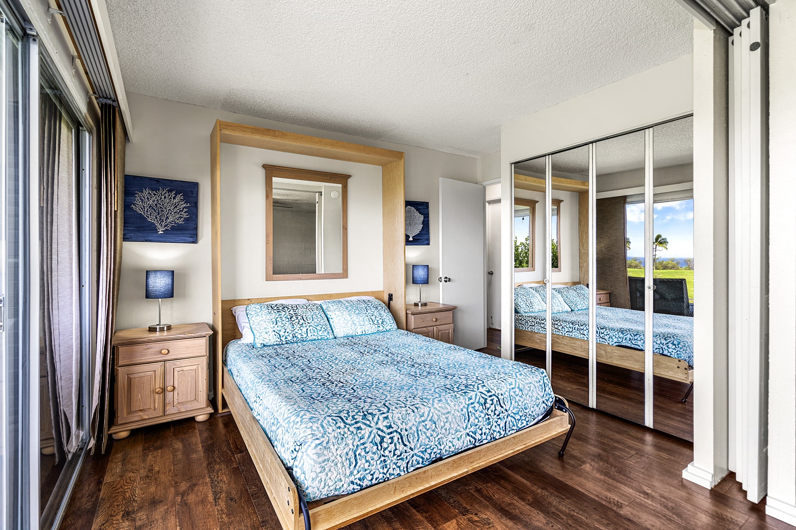 Kailua Kona Vacation Rentals, Keauhou Akahi 302 - Secondary bedroom with Queen murphy bed, shoji doors, and Lanai access