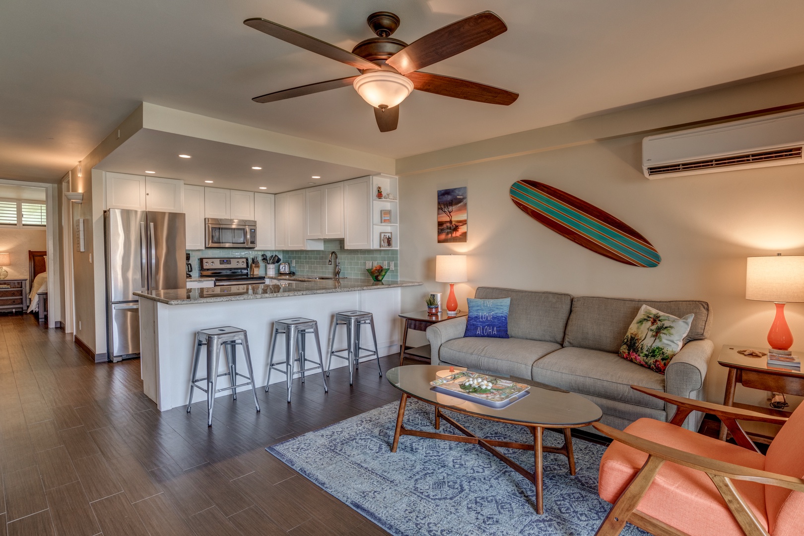 Lahaina Vacation Rentals, Papakea B-105 - Relax in the inviting living area, featuring cozy sleeper sofa and vibrant décor, ideal for unwinding after a day of adventure