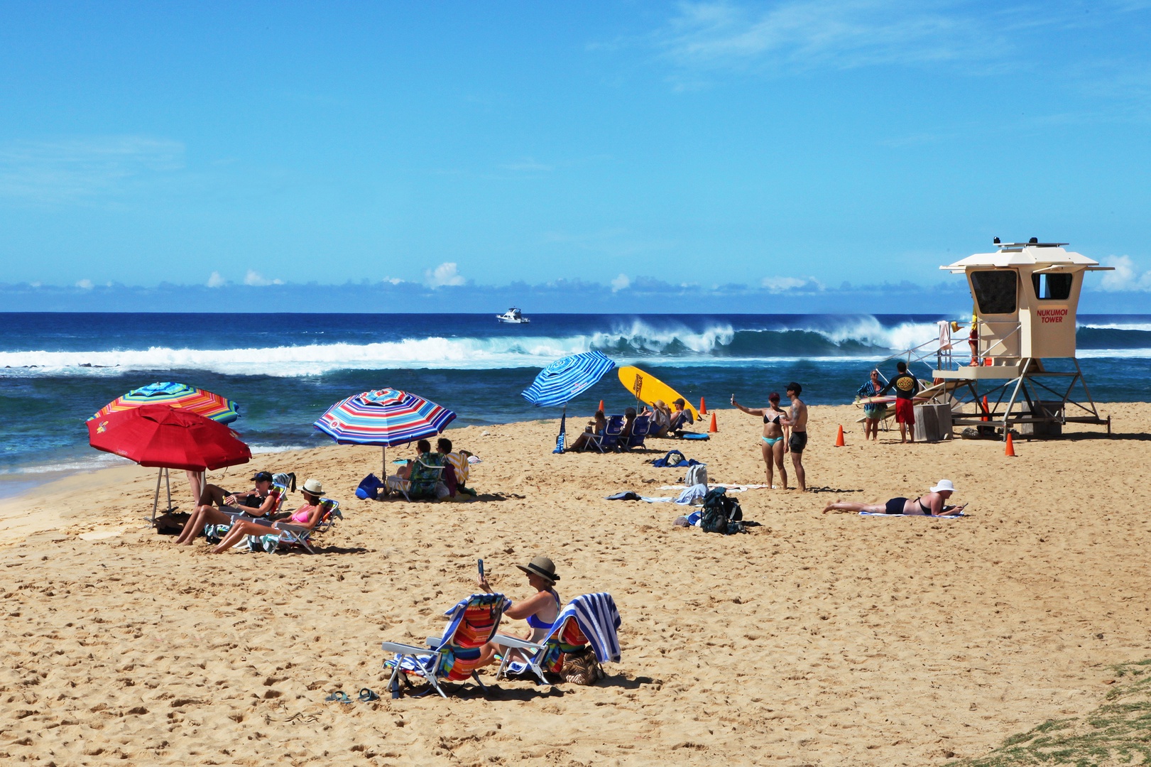 Koloa Vacation Rentals, Hale Kai'Opua - Aerial view of Poipu Beach Park, with waves gently lapping the shore.