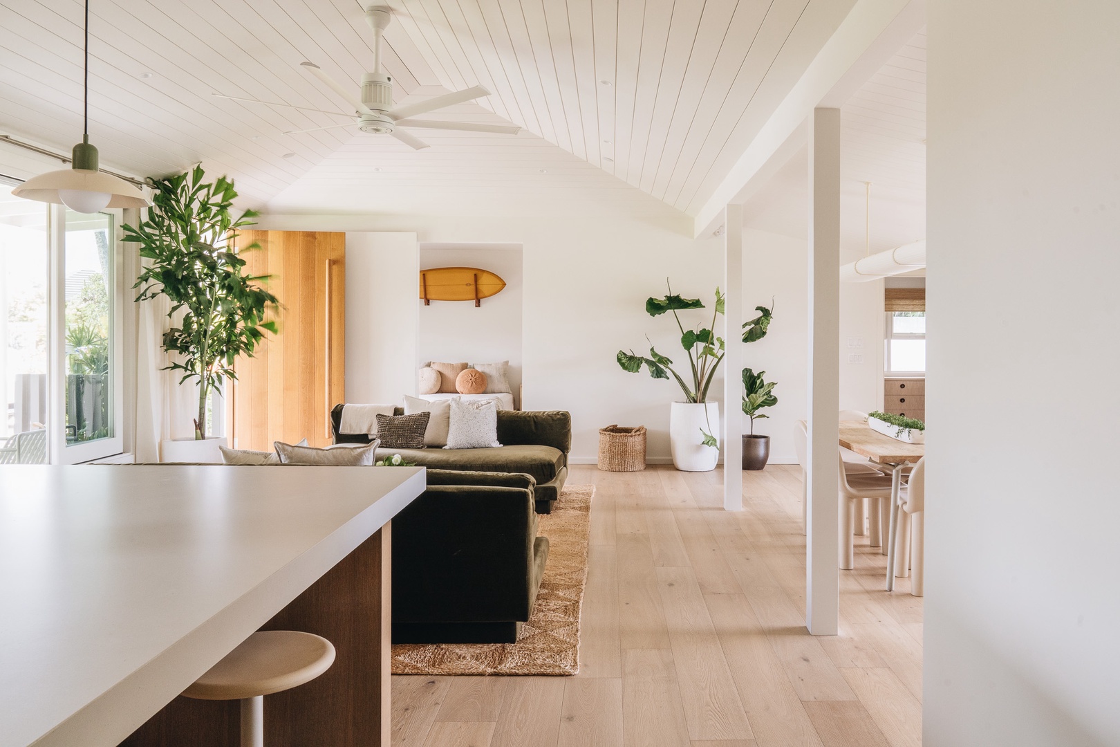 Honolulu Vacation Rentals, Surfside Bungalow** - Vaulted ceilings, natural light, and warm finishes create an open, welcoming space designed for relaxation and connection.