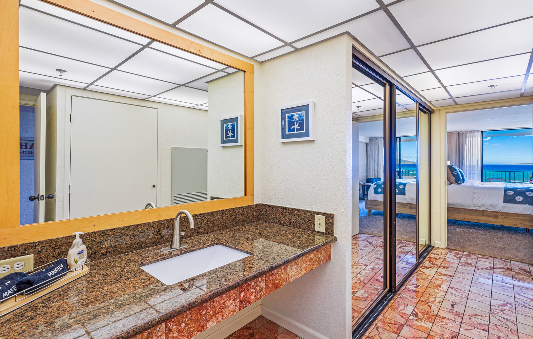 Lahaina Vacation Rentals, Kaanapali Shores 502 - This vanity area offers plenty of counter space and a large mirror, ideal for getting ready comfortably.