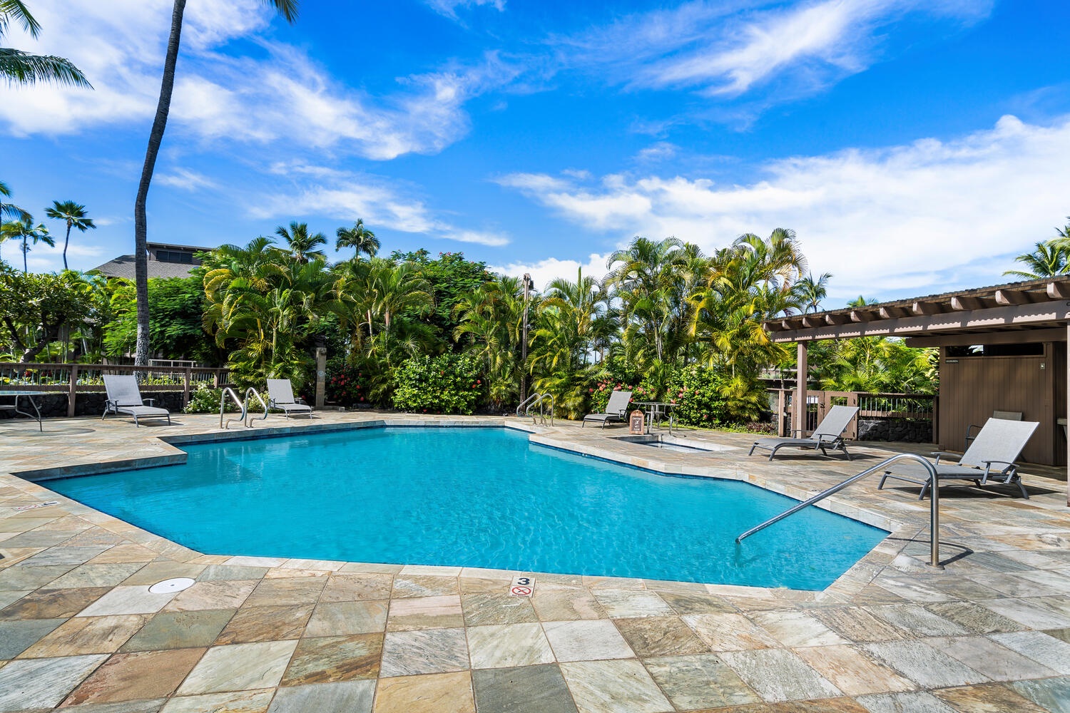 Kailua Kona Vacation Rentals, Kanaloa at Kona 3303 - Enjoy the tropical landscaping surrounding the pool area.