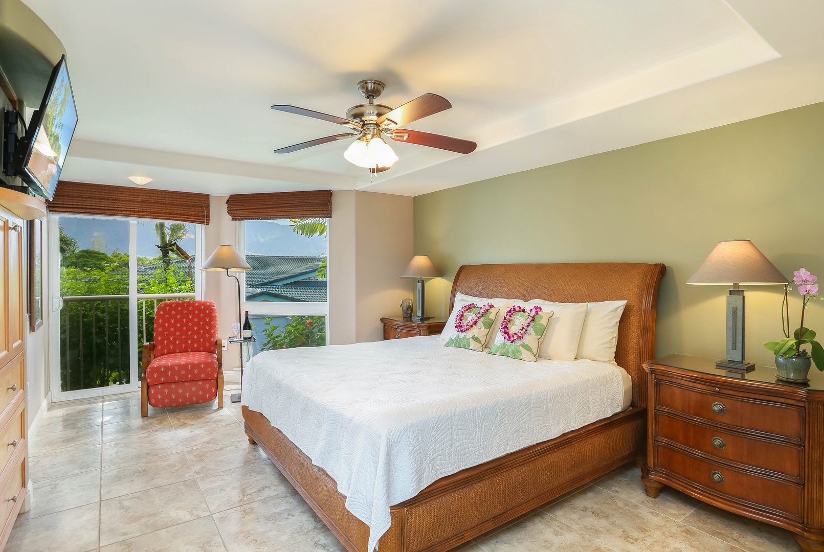Princeville Vacation Rentals, Nohea Villa - The primary suite has a king bed and access to a private lanai.