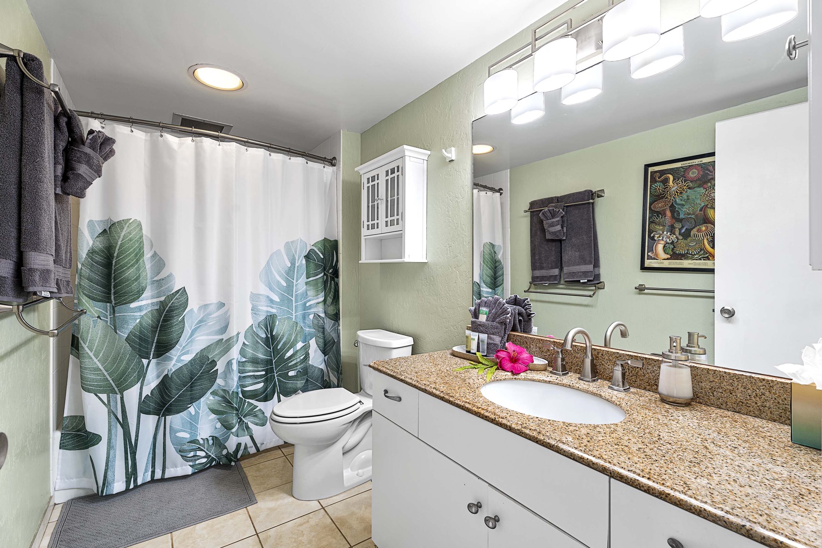Kailua Kona Vacation Rentals, Kona Makai 6303 - Well-lit mirror on your home's full bathroom with a tub