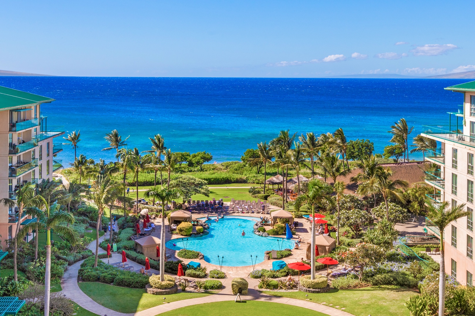 Lahaina Vacation Rentals, Honua Kai Hokulani 214 - Aerial view of the pool near Hokulani 214 'Kamalu,' surrounded by tropical beauty.