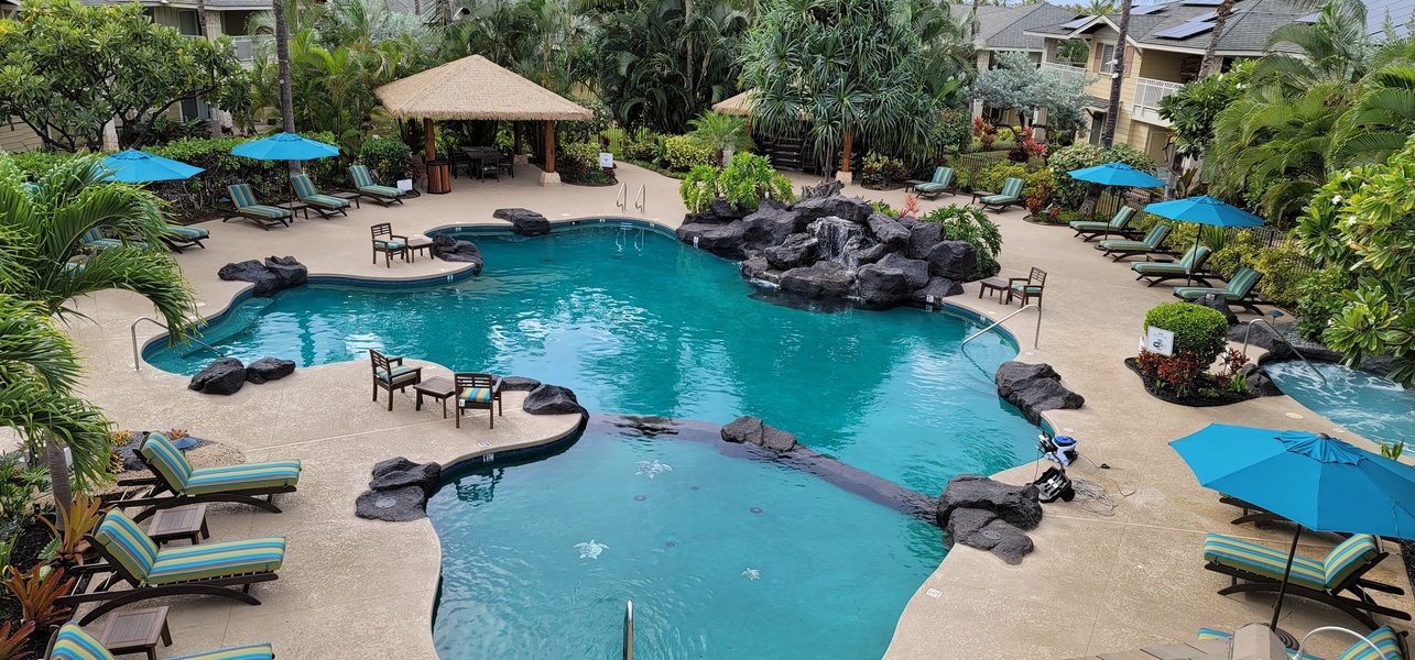 Kapolei Vacation Rentals, Ko Olina Kai 1059F - Relax by the resort-style pool surrounded by tropical landscaping—perfect for a refreshing swim or peaceful afternoon in the sun.