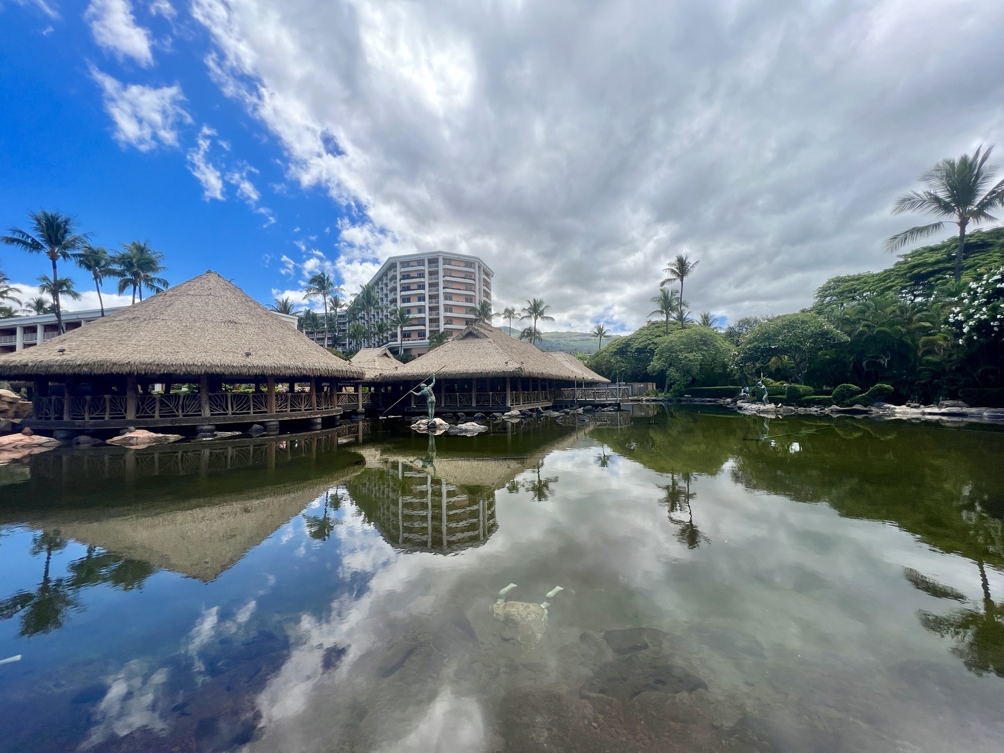 Wailea Vacation Rentals, Wailea Luxury Residence Hoolei 93-3 - Relax by the pond with stunning reflections and cozy huts.