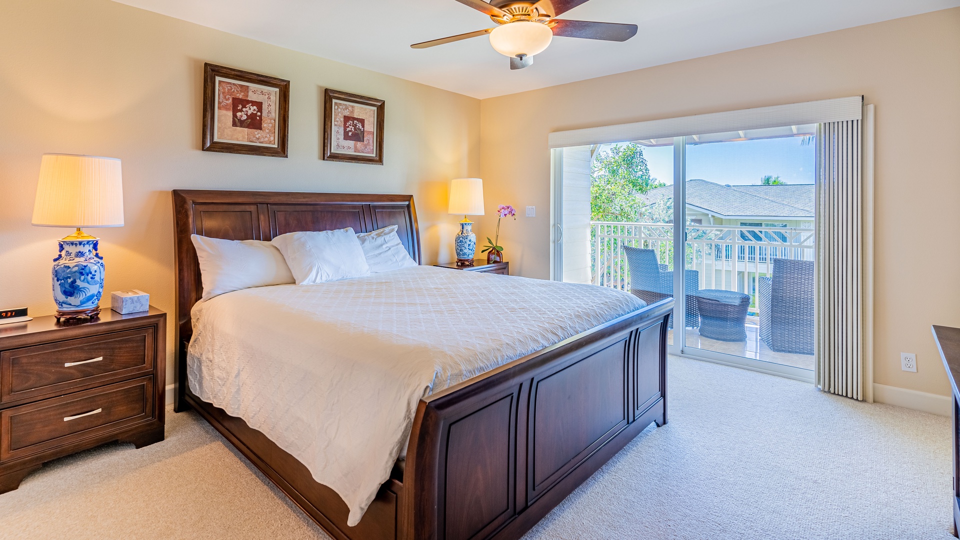 Kapolei Vacation Rentals, Ko Olina Kai 1033C - The spacious primary guest bedroom upstairs with a ceiling fan and soft linens.