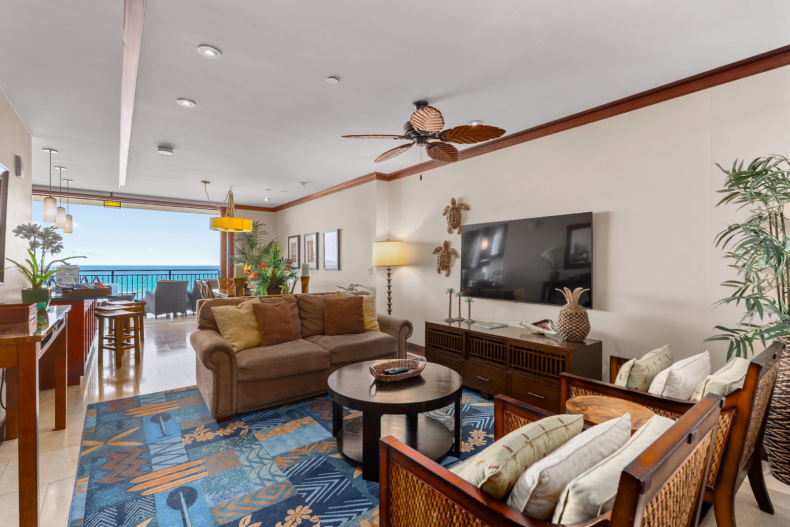 Kapolei Vacation Rentals, Ko Olina Beach Villas O1404 - Sink into the sofa with the sliders open and the ocean framed just past the lanai.