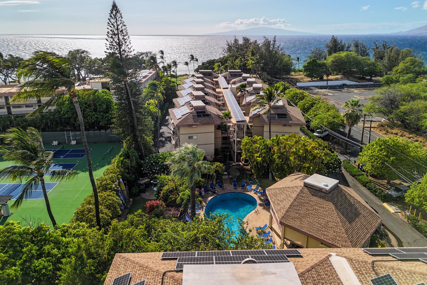 Kihei Vacation Rentals, Haleakala Shores A206 - The ocean stretches out past the complex, with neighboring islands visible on a clear day.