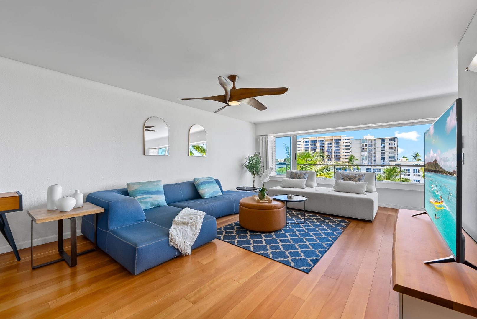 Honolulu Vacation Rentals, Colony Surf Retreat - With soft tones, coastal textures, and views from every angle, this living space delivers laid-back luxury.