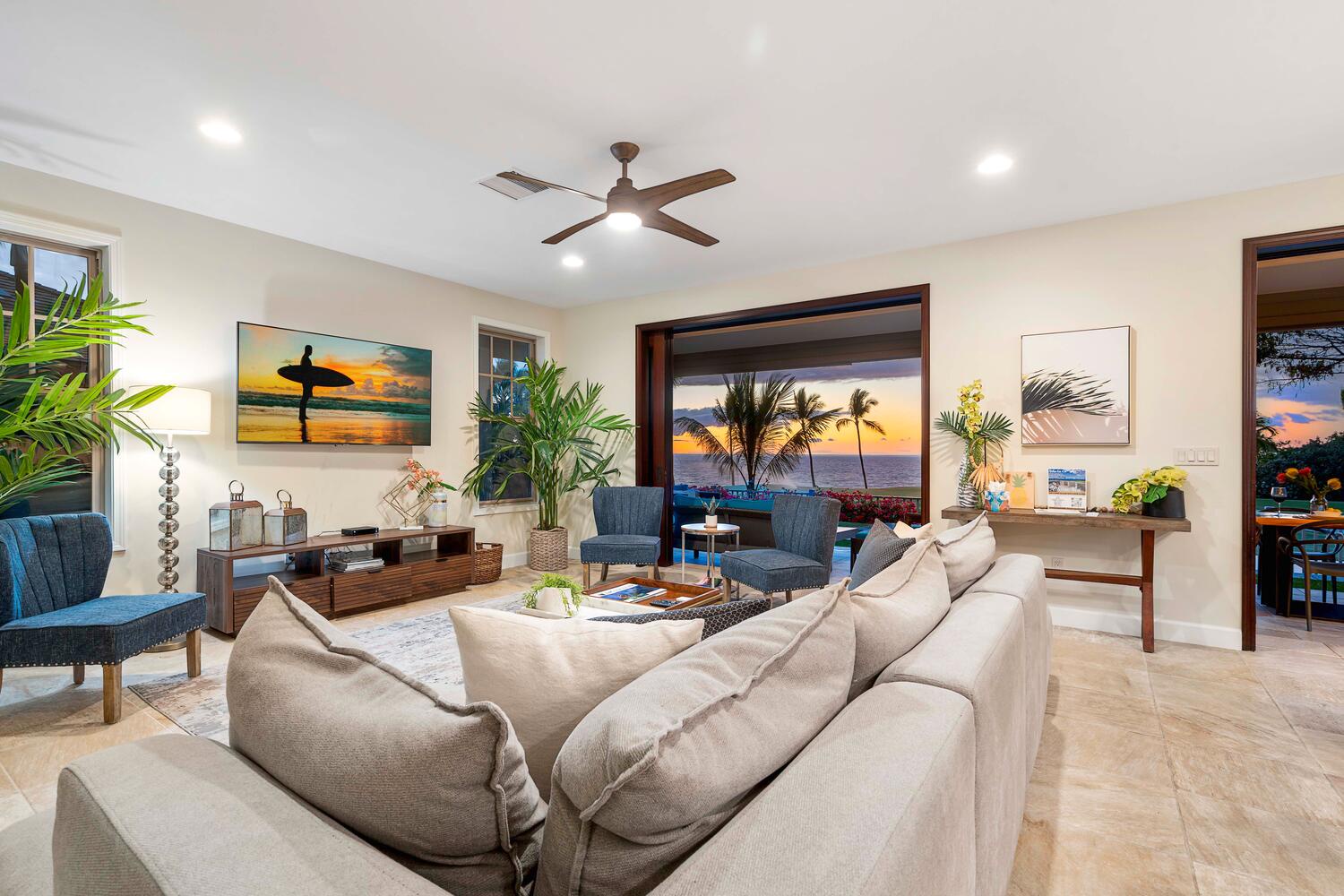 Kailua-Kona Vacation Rentals, Holua Kai #26 - Inviting living room with plush seating and panoramic sunset views.