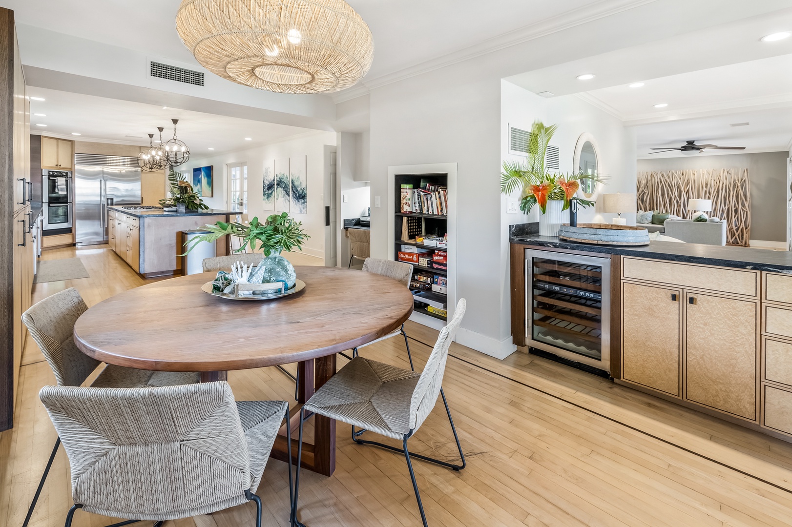 Honolulu Vacation Rentals, Moana Lani - Main House - Coffee at the round table in the breakfast nook, with the wine fridge saved for later.