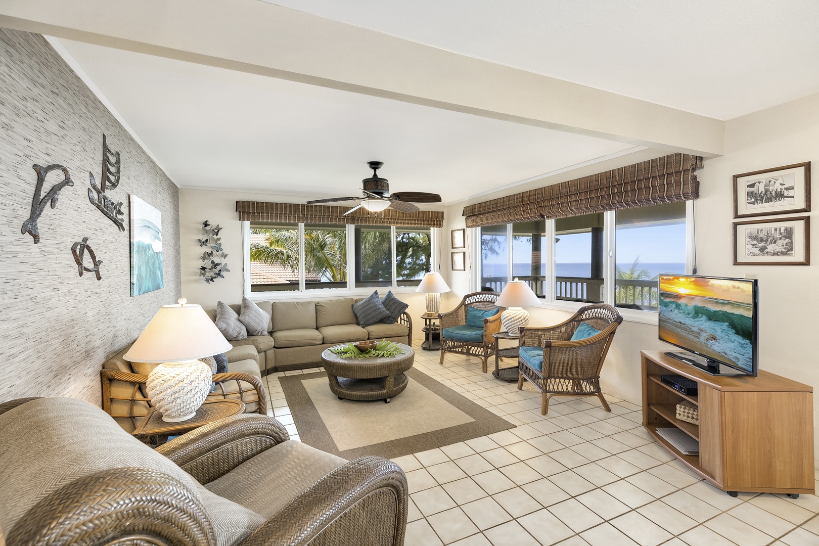 Haleiwa Vacation Rentals, Hale Kimo - Main-level living area with comfortable seating and sliding doors to the lanai.