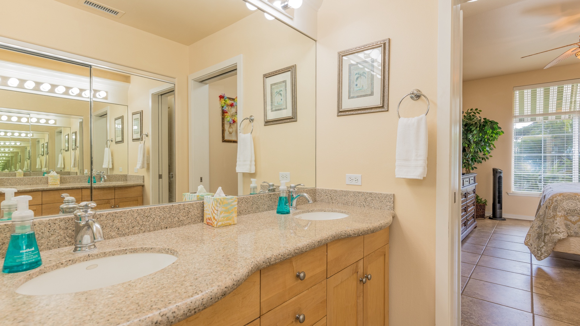 Kapolei Vacation Rentals, Kai Lani 8B - The primary guest bathroom with a double vanity.