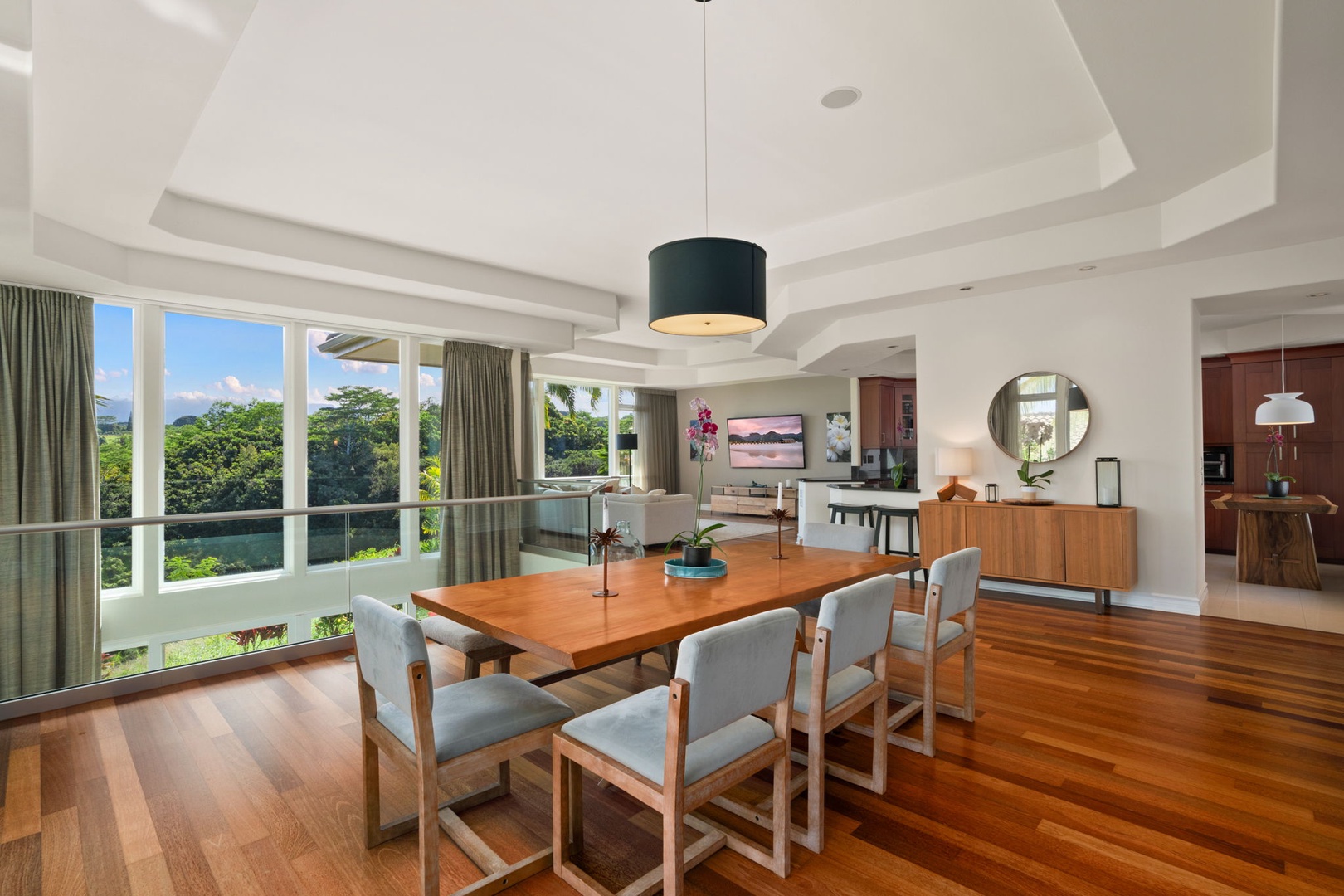 Princeville Vacation Rentals, Kaiulani #8 - Dinner for eight comes with palms and treetops filling a full wall of windows.