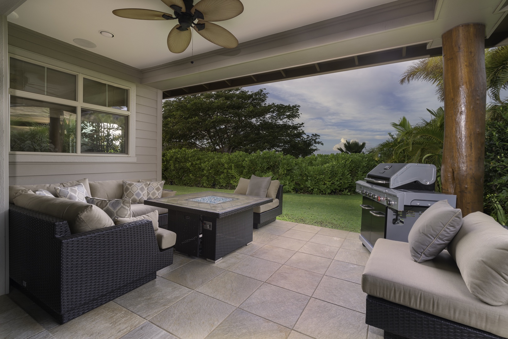 Kamuela Vacation Rentals, Mauna Lani KaMilo #407 - The covered lanai is an ideal outdoor living space.