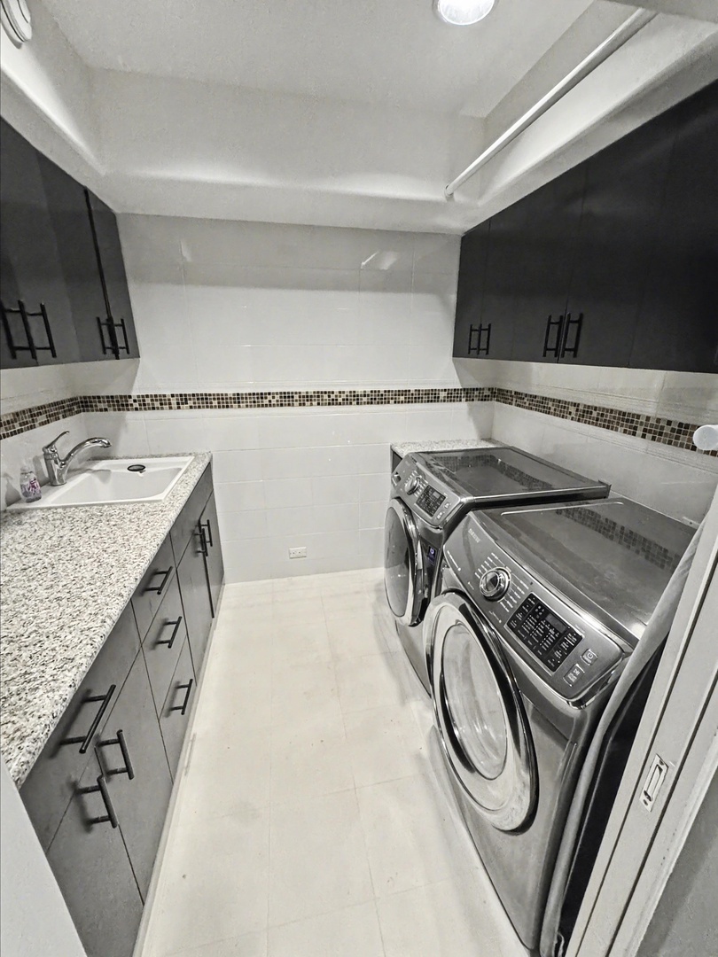 Kailua Kona Vacation Rentals, Hale Nai'a - You'll love having your own dedicated laundry room with modern appliances and plenty of storage space for all your vacation essentials.