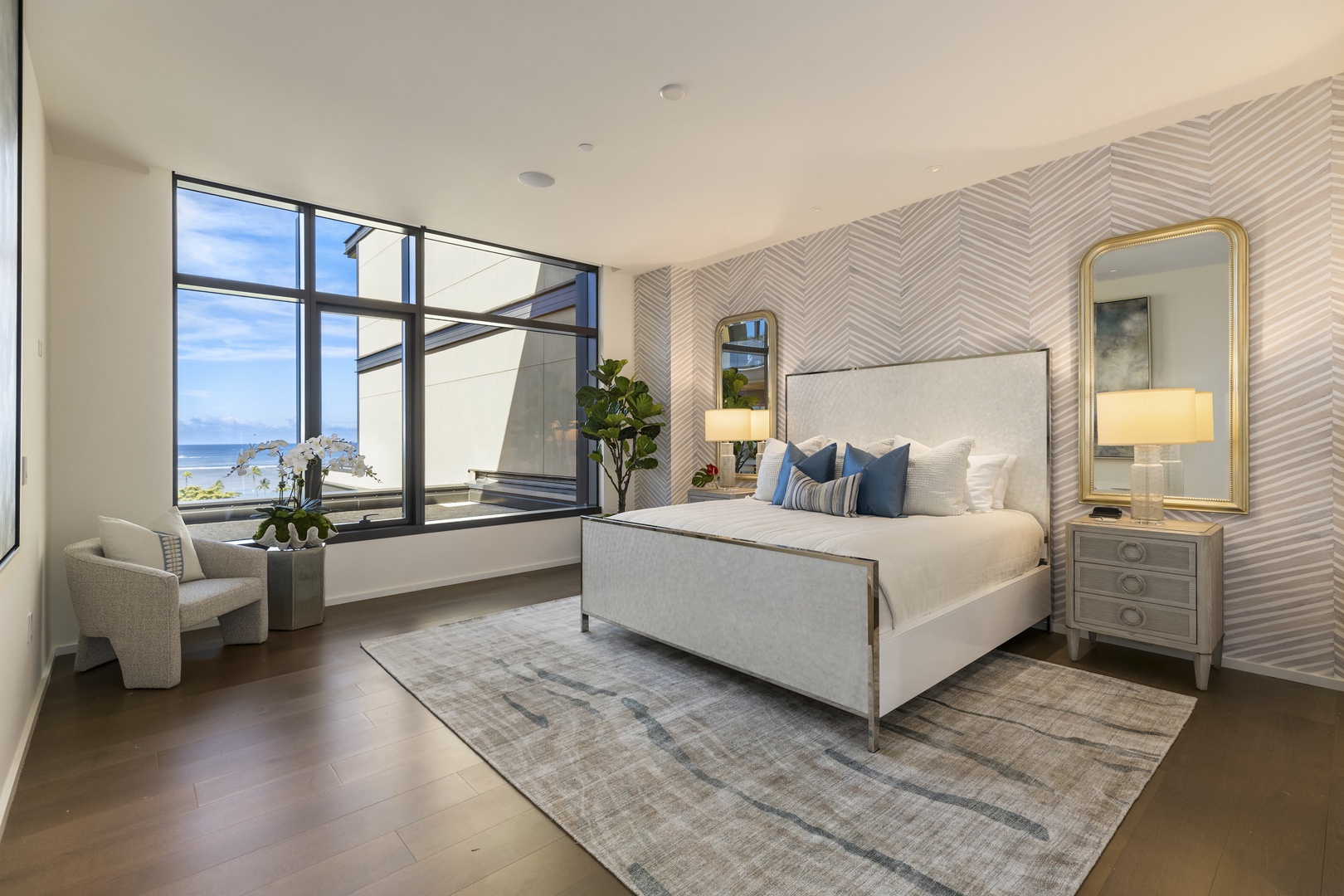 Honolulu Vacation Rentals, Park Lane Sky Resort - The primary suite has a king bed, ocean views, central A/C, and an ensuite bath