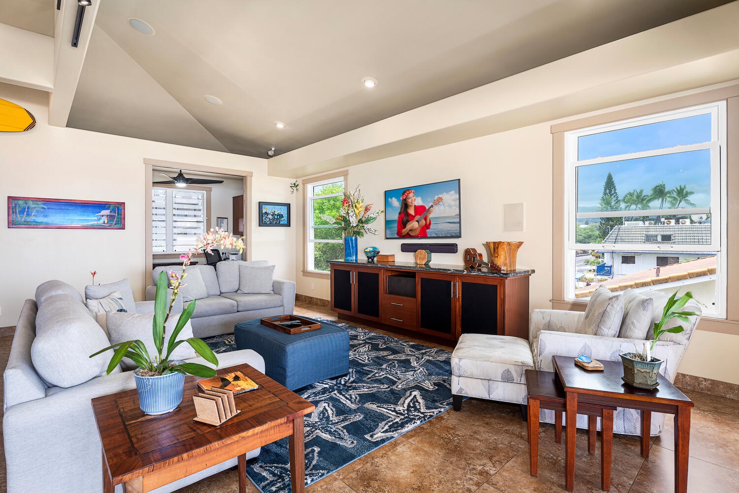 Kailua Kona Vacation Rentals, Kailani Vista - After snorkeling sessions or putting-green practice, cool off on the sofa and stream a movie without losing sight of the water.