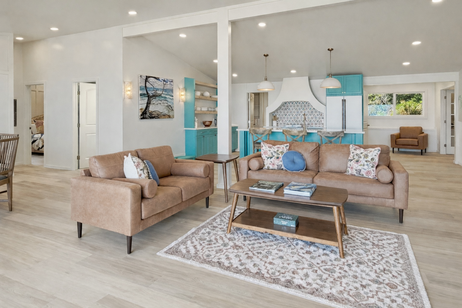 Kailua Vacation Rentals, Kai Nalu - Sink into plush leather sofas in your spacious living area, where coastal-inspired turquoise accents and modern design create the perfect retreat.