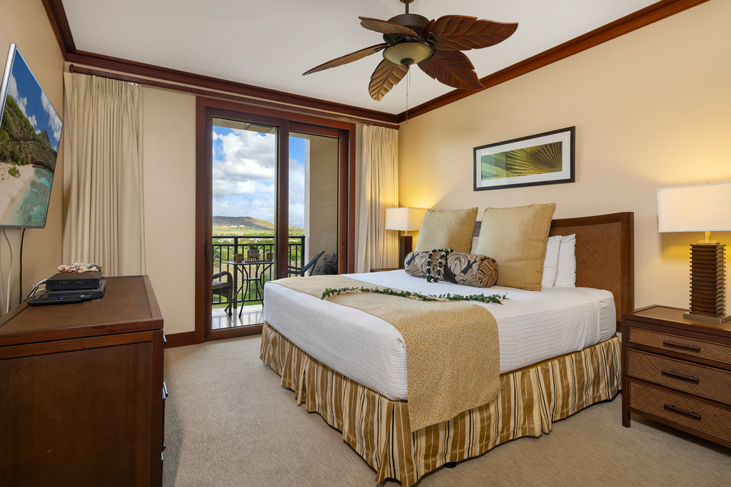 Kapolei Vacation Rentals, Ko Olina Beach Villas O1105 - The primary suite features king bed and private lanai.