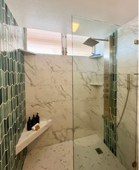 Lahaina Vacation Rentals, Royal Kahana 308 - This walk-in shower features a modern design with sleek marble tiles, a rainfall showerhead, and custom accents for a luxurious and refreshing experience.