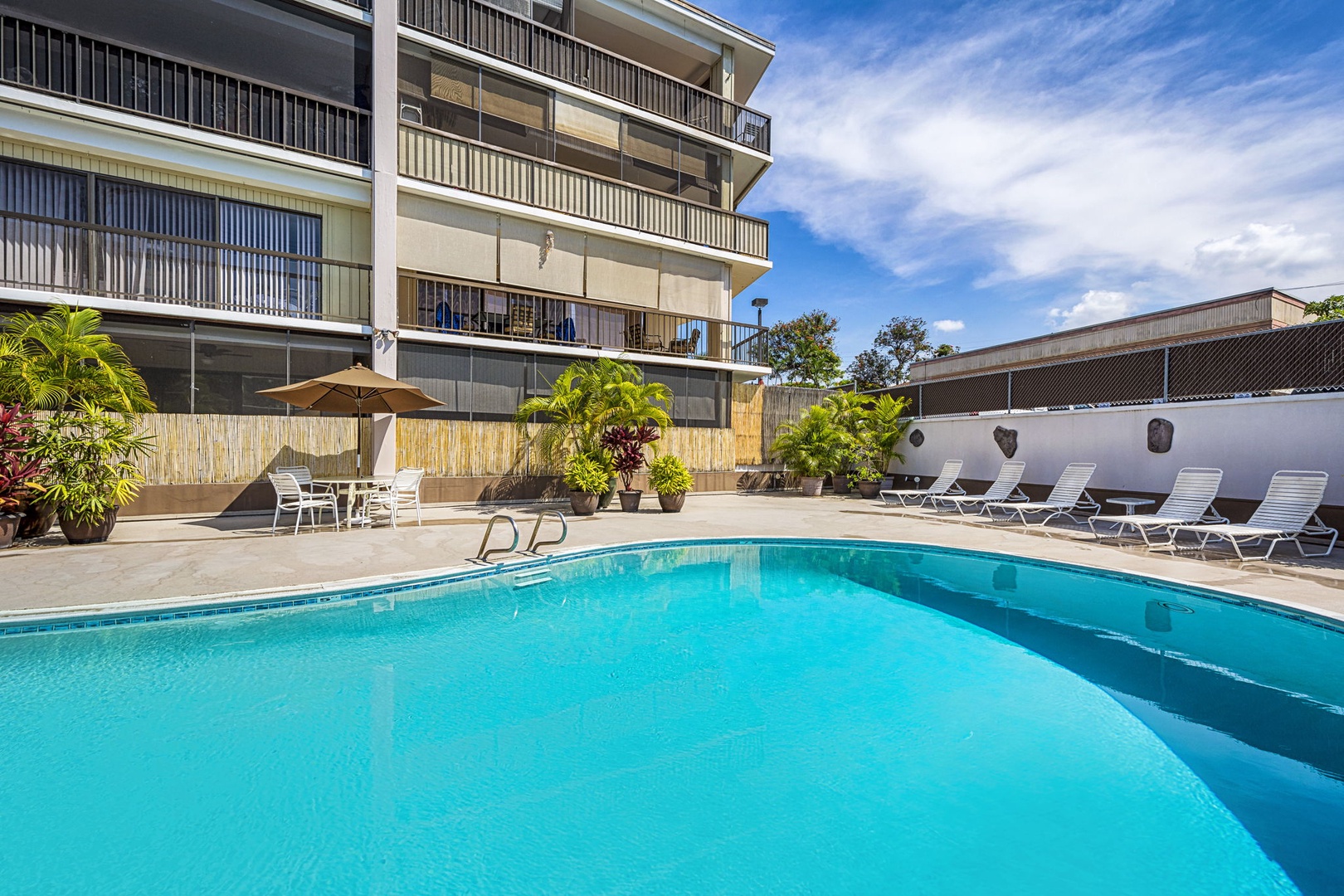 Kailua Kona Vacation Rentals, Kona Plaza 201 - Sparkling pool area perfect for a refreshing swim and soaking up the Hawaiian sun.