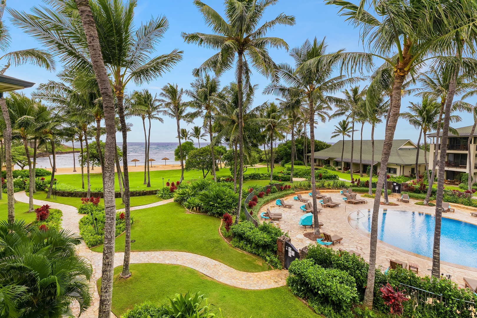 Kahuku Vacation Rentals, Turtle Bay Villas 307 - Views of the pool, beach, and ocean from the comfort of your lanai