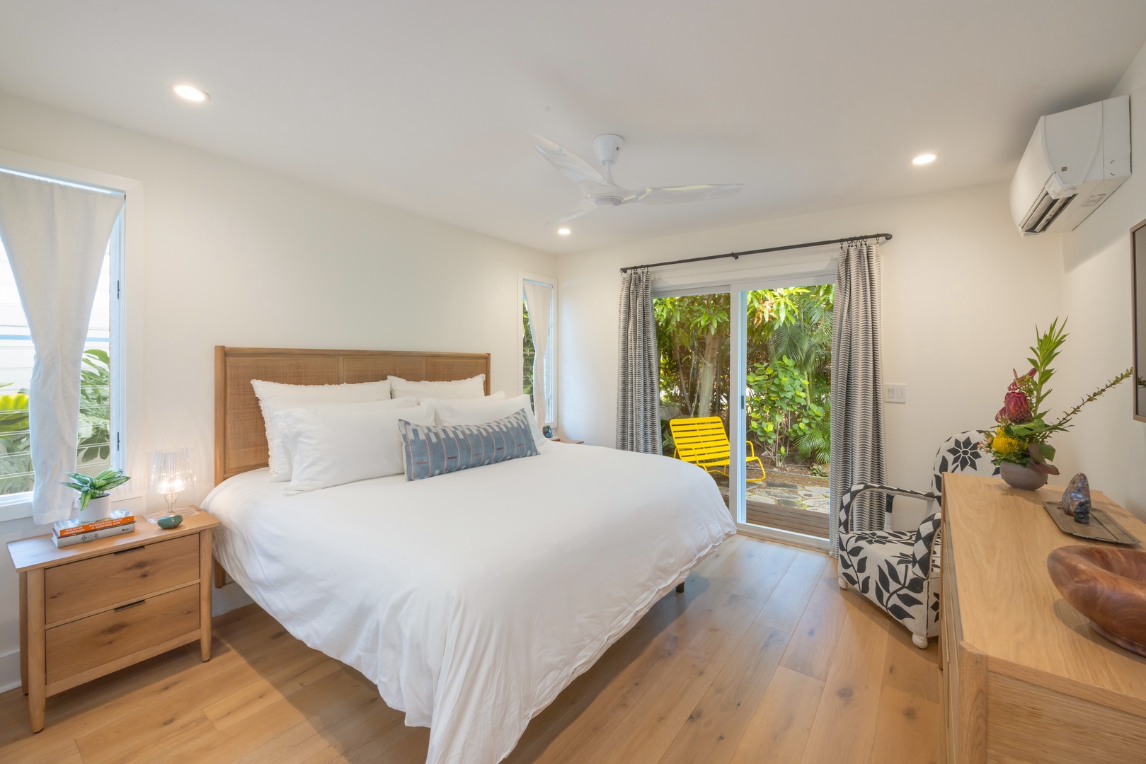 Kailua Vacation Rentals, Lanikai Ola Nani - Experience restful luxury in the primary suite, featuring a king bed, garden access, and spa-style ensuite bathroom.