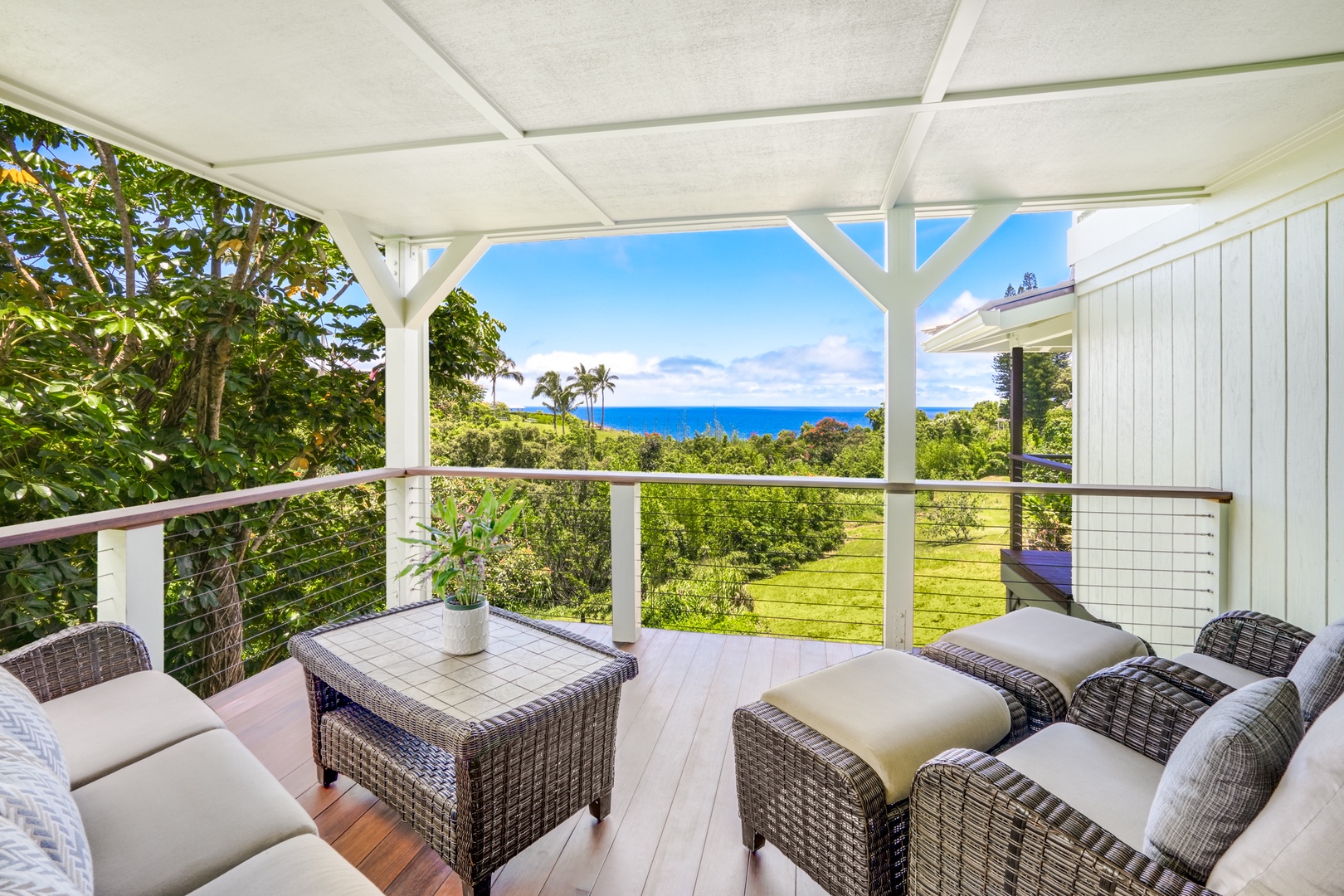 Princeville Vacation Rentals, Wai Lani - Guest Room 2 - private lanai area with comfy outdoor seating.