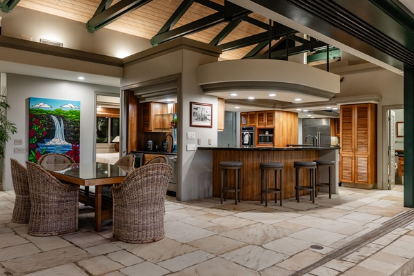 Kamuela Vacation Rentals, Champion Ridge 22 & 24 - Spacious kitchen and dining area with a large island and bar seating, perfect for casual meals.