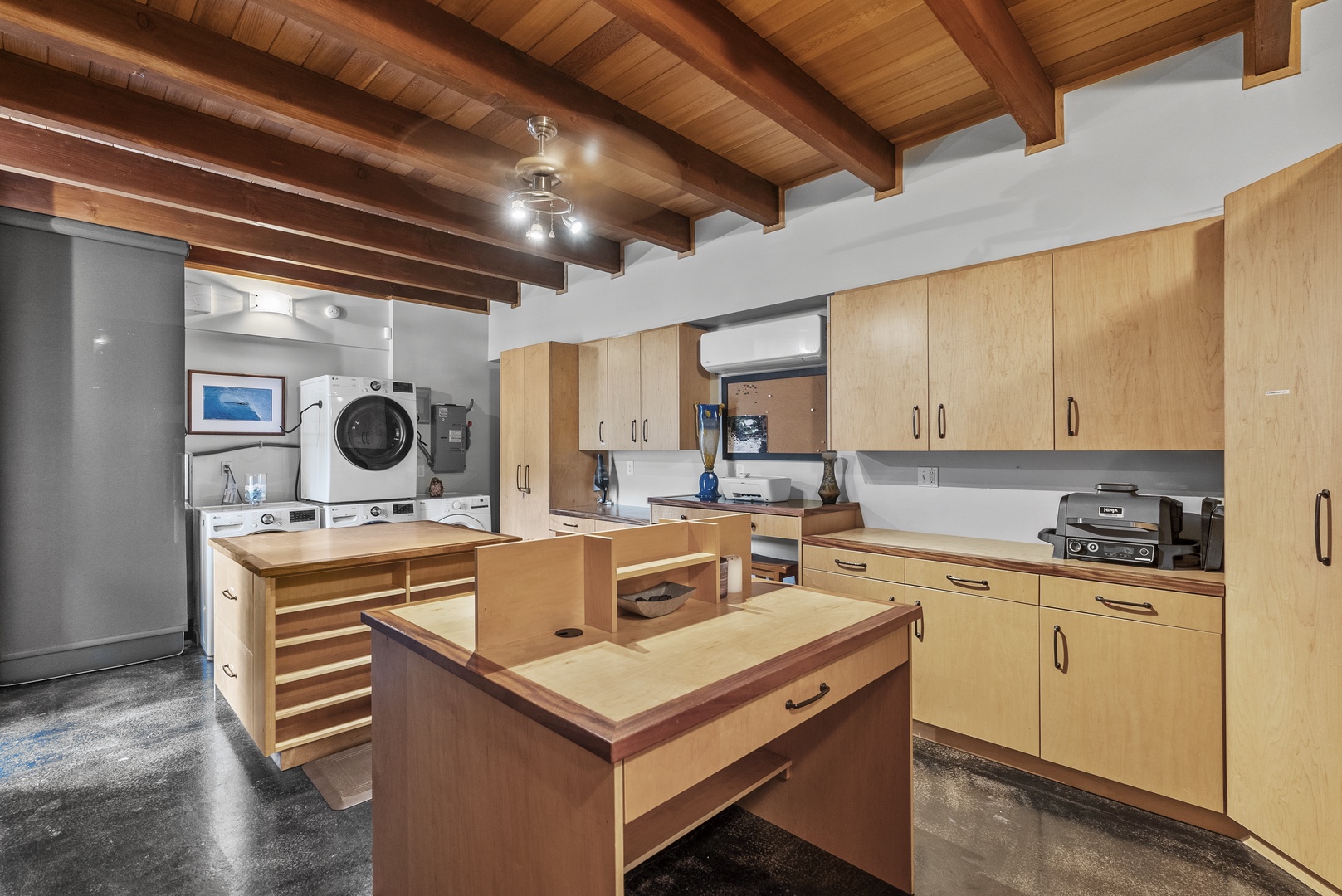 Haleiwa Vacation Rentals, Samurai House - Fully equipped laundry room with stainless steel appliances and island seating.