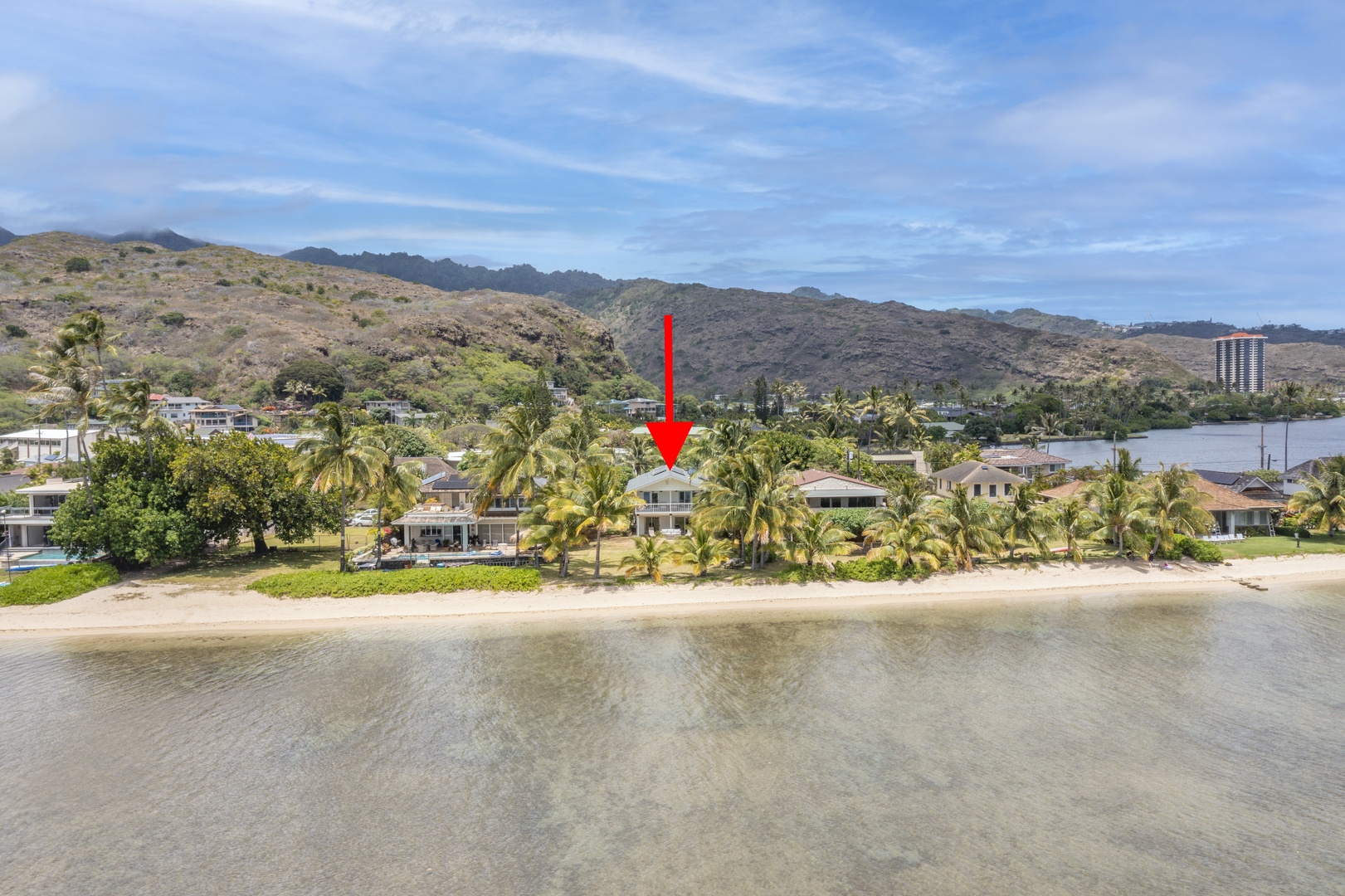 Honolulu Vacation Rentals, Honolulu Beachfront Retreat - Highlighted aerial shot showing the home’s perfect location along the sandy beach.