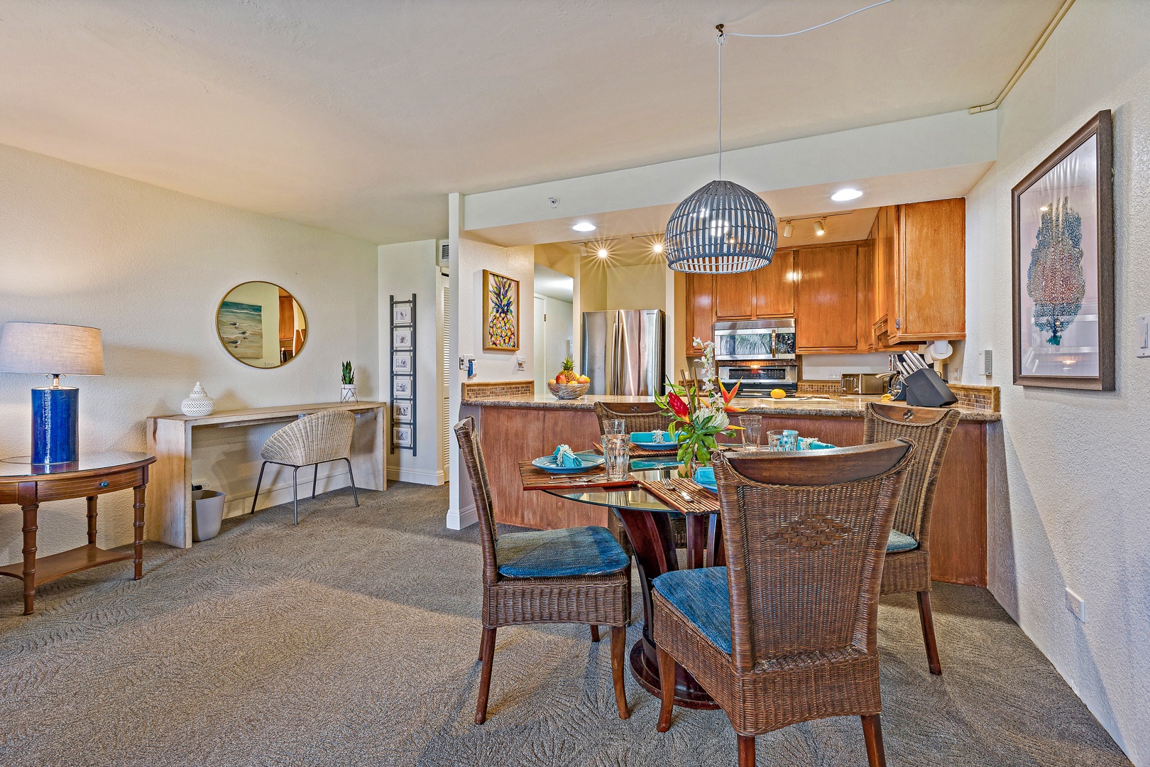 Lahaina Vacation Rentals, Kaanapali Shores 544 - The dining area is set up for memorable meals and conversations, with comfortable seating and easy access to the kitchen for a seamless dining experience.