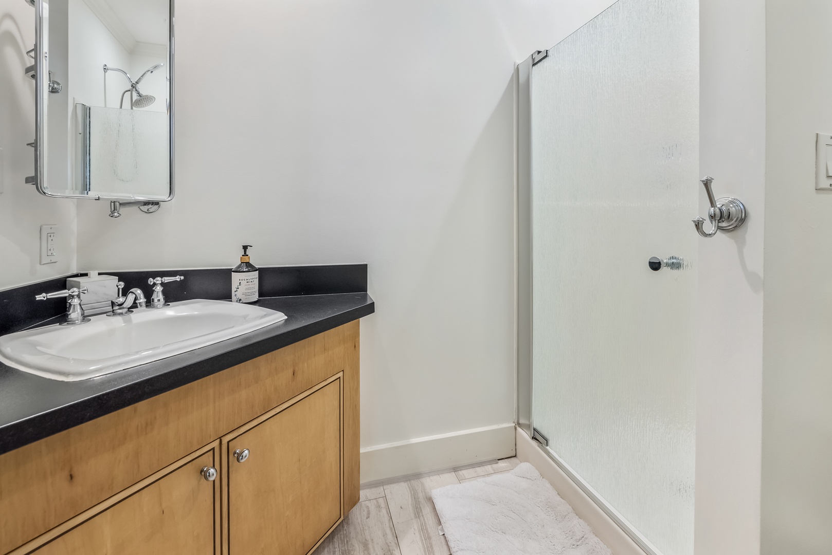 Honolulu Vacation Rentals, Moana Lani - Main House - A glass-walled walk-in shower for a quick rinse before heading back out.