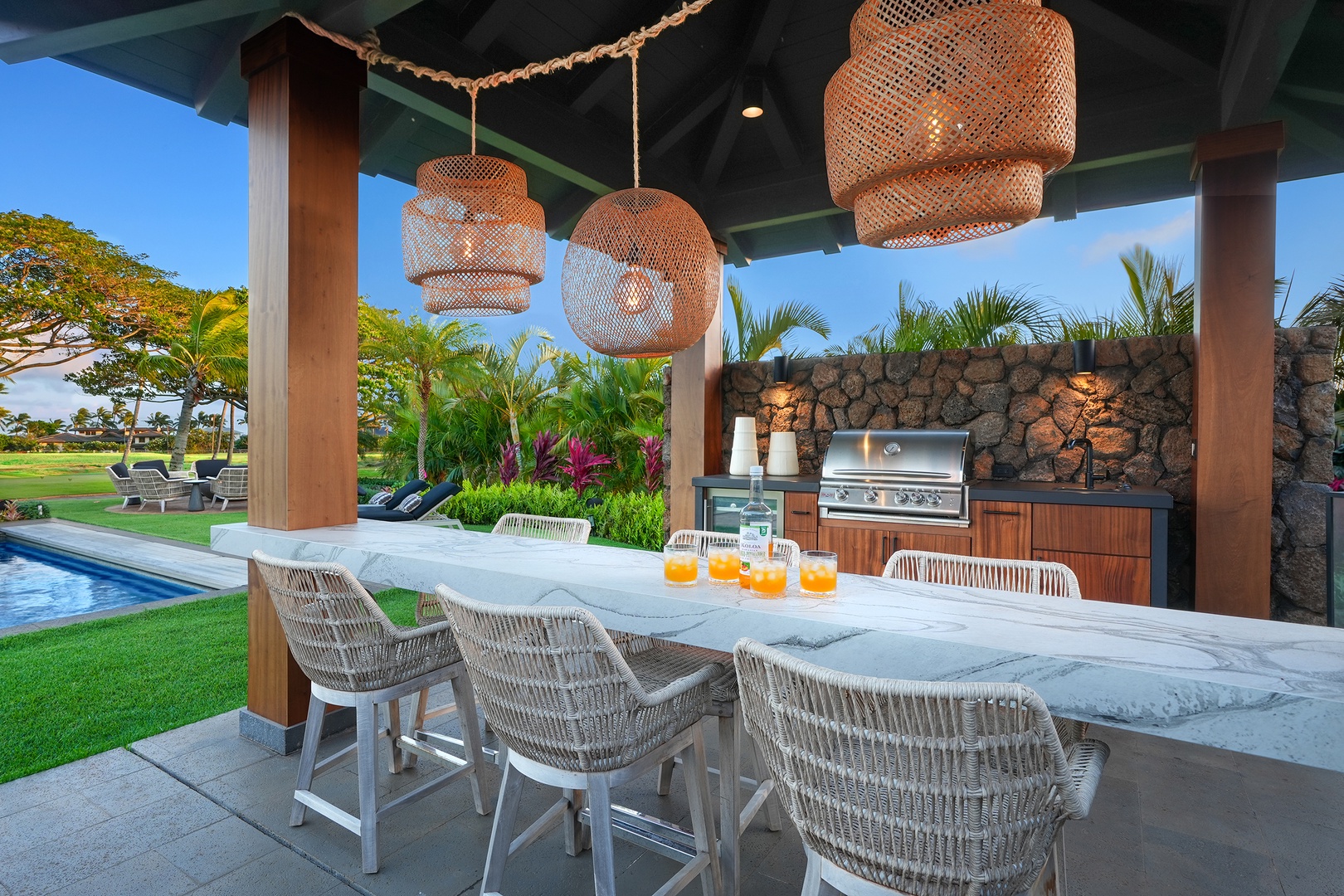 Koloa Vacation Rentals, Hale Pakika at Kukui'ula - Grab a seat the tropical poolside bar and grill setup for your end of day recap.