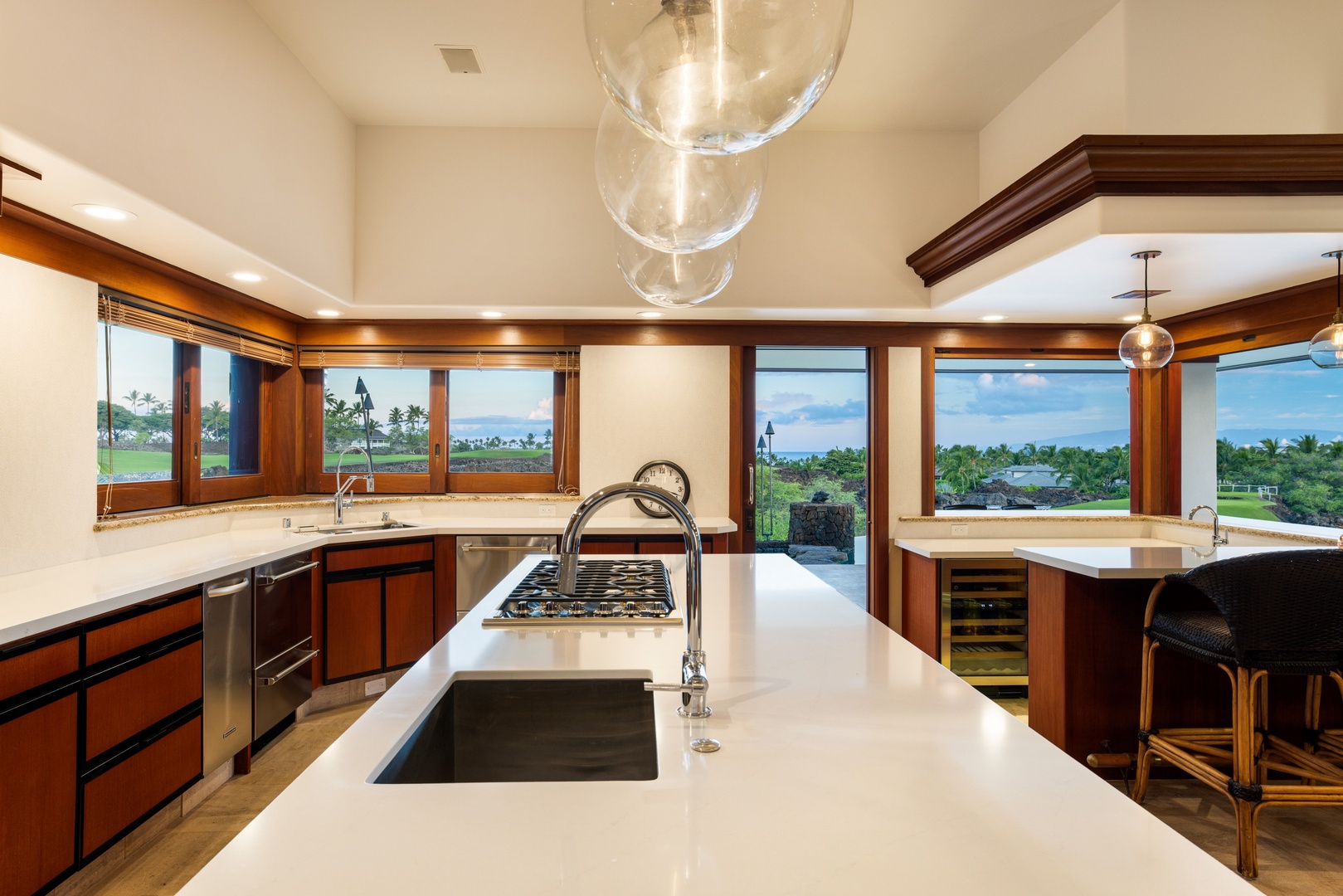 Kamuela Vacation Rentals, Champion Ridge 7 - The chef’s kitchen features a six-burner gas range, Sub-Zero refrigeration, and plenty of prep space for gourmet meals.