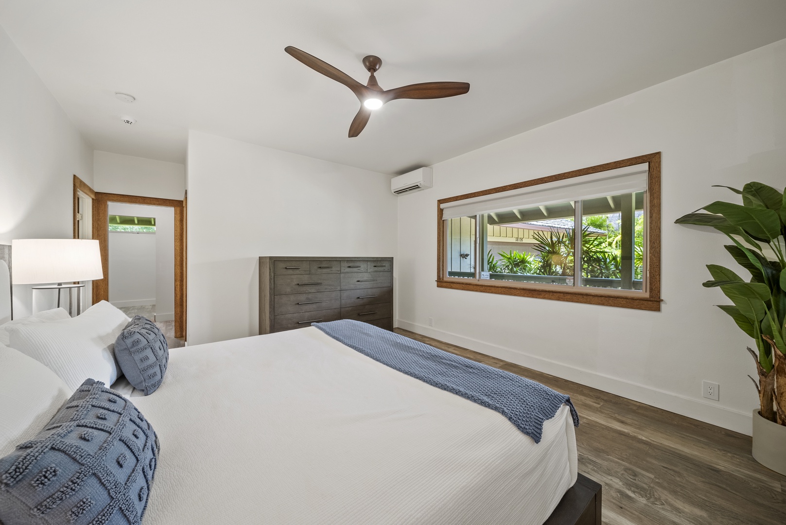 Haleiwa Vacation Rentals, Kaunala Retreat - Bright, airy sleeping quarters with A/C and tasteful furnishings—ideal for restful island nights.