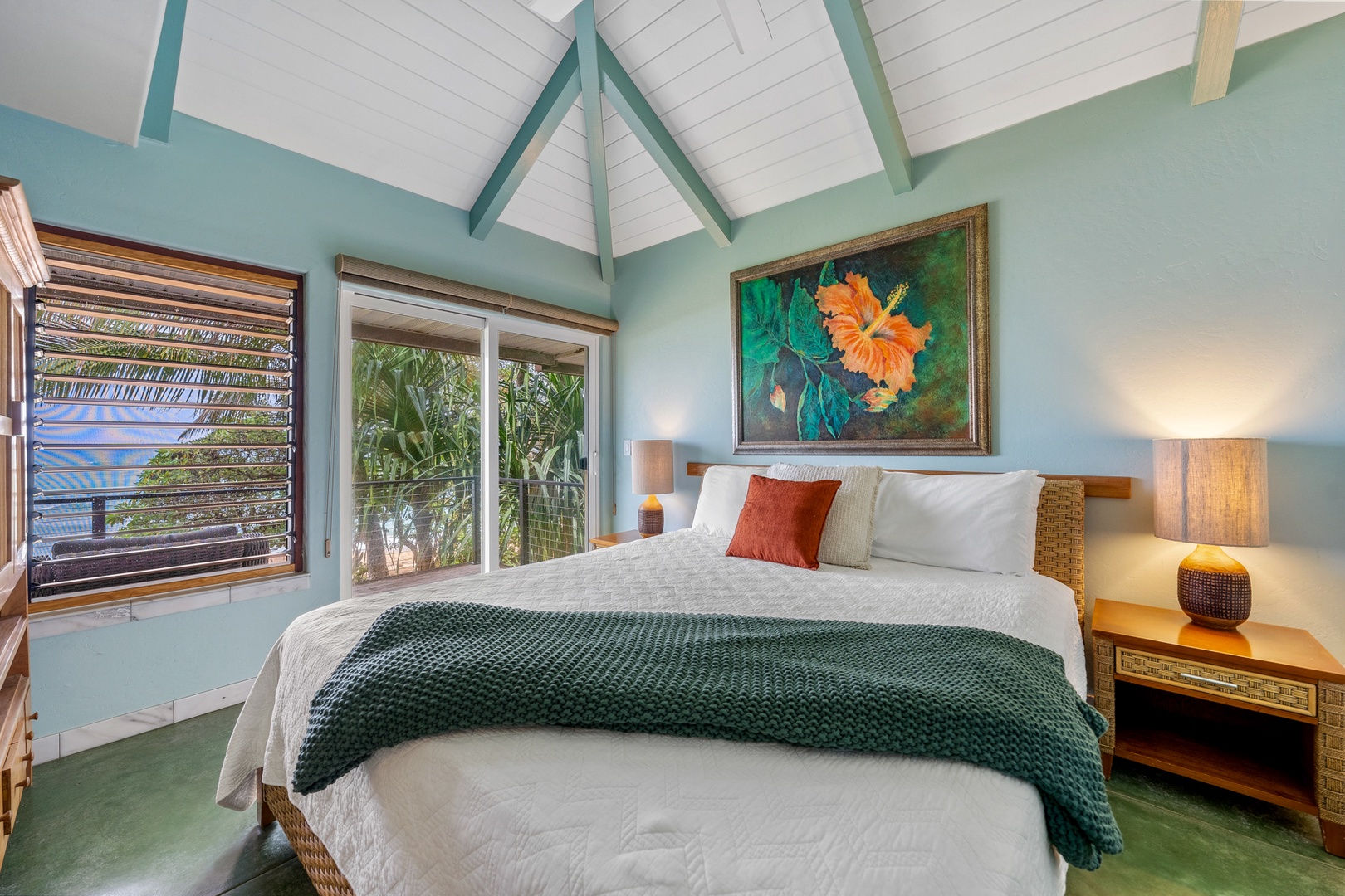 Hanalei Vacation Rentals, Hale Kepuhi - Relax in your tropical sanctuary with soaring vaulted ceilings, soft linens, and vibrant island artwork creating the perfect peaceful retreat.
